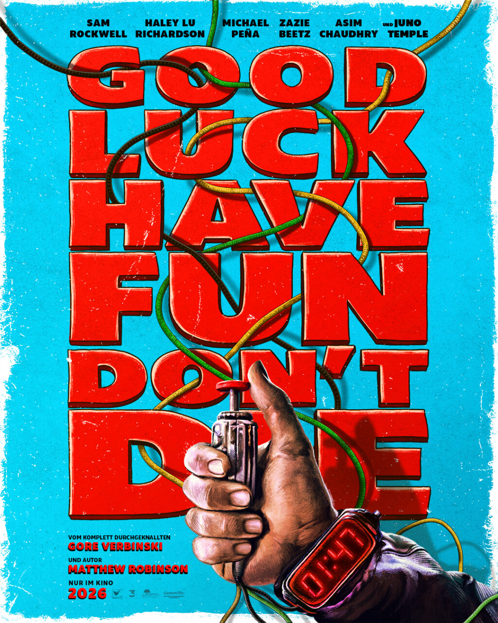 Filmplakat mit dem Titel 'Good Luck Have Fun Don't Die', das einen bärtigen Mann in einem Raumanzug zeigt, umgeben von farbigen Kabeln und verschiedenen Objekten.